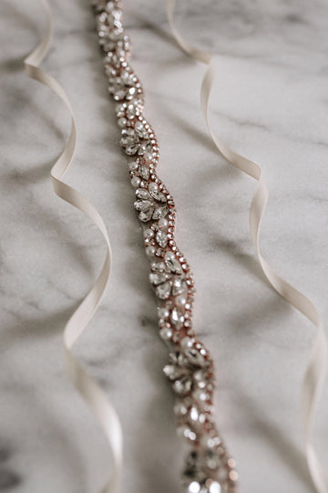 elegant crystal and pearl bridal sash in rose gold